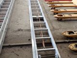 many pallets that are lined up on the ground
