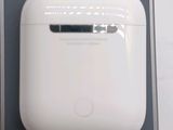 a white airpods sitting on top of a table