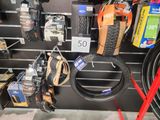 a display of bicycle parts and accessories on the wall