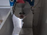 a machine that is sitting in the corner of a room