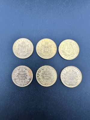 six pièces britanniques différentes, dont une de une livre et une de une livre