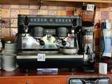 a coffee machine sitting on a counter in a kitchen