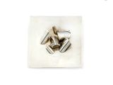 an image of a picture of a metal object on a white surface