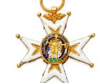 l'image d'une médaille d'or et de blanc ornée d'une croix