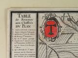a picture of a table with a red and black design on it