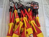 a bunch of tools in a plastic container on a table