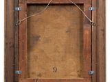 an old wooden frame with a rope hanging from it ' s sides