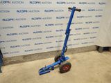 an image of a blue hand truck with a red wheel