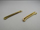 a pair of brass plated hair pins