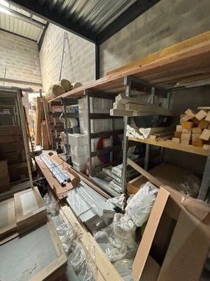 a room filled with lots of boxes and shelves