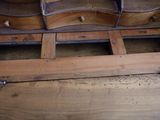 a wooden bench that has been built into the floor