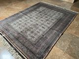 a large rug on the floor in a room