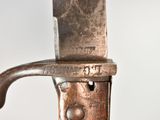 a close up of a knife on a table