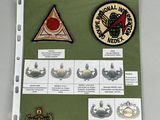tout un tas d'insignes militaires différents sur une feuille de papier