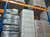 a large amount of boxes on a pallet in a warehouse