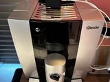 a coffee maker that is sitting on a table