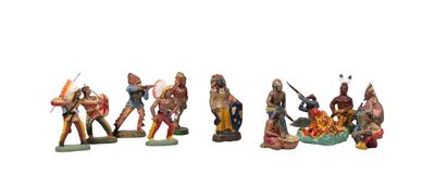 five figurines of native americans on a white background