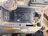 a machine that is sitting on the side of the road