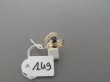 an image of a ring with a name tag attached to it