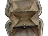 an open suitcase with a handle on a white background