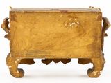 a small wooden box that is sitting on a table