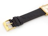 an image of a close up of a watch on a white surface
