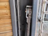 an image of a machine that has a chain attached to it