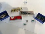 a lot of small toys that are sitting on a table