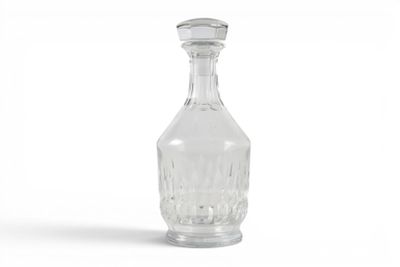 an image of a clear glass bottle on a white background
