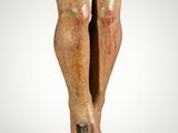 a close up of a statue of a person on a cross