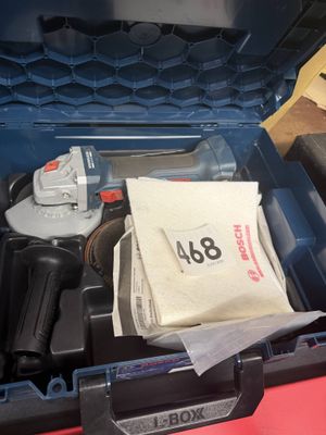 a tool box with tools inside of it on a table