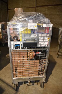 a metal cart with a bunch of items in it