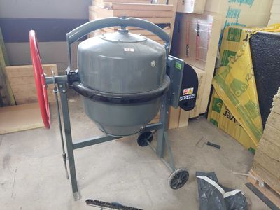 a large gray machine that is sitting in a room