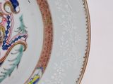 a plate with a picture of a woman on it