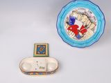 a small plate and a small bowl on a table