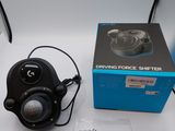 a box and a pair of headphones sitting on a table