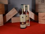 a bottle of wine that is sitting on a table