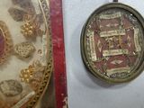 a picture of a picture of a medal and a picture of a medal