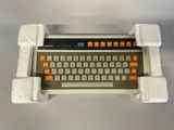 an old computer keyboard that is sitting on a table