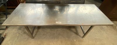 a table that is sitting in the middle of a room