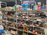 a large amount of items on the shelves in the store