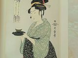 a picture of a woman holding a plate of food