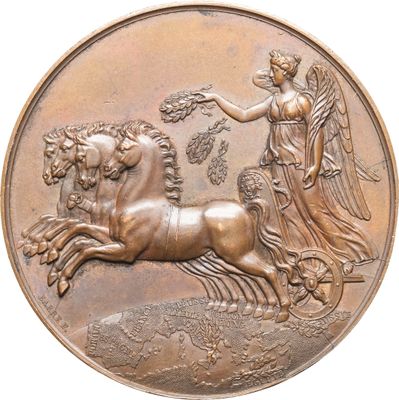 une médaille de bronze représentant un cheval et une femme