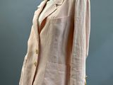 an image of a pink jacket and skirt on a mannequin