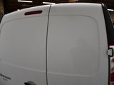 a white van that is parked in a garage
