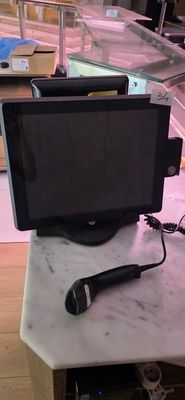 a microphone sitting on top of a table next to a monitor
