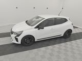 the small white car is parked in the garage on the checkered floor