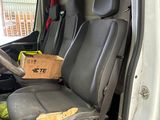 a picture of the inside of a van with the seats down