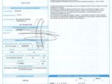 a close up of a document with a picture of a person on it