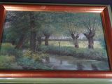 une photo d'un tableau accroché au mur